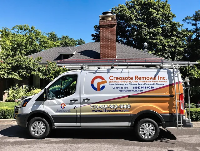 Wilton Chimney Sweep technician removing creosote safely in Wilton, CT